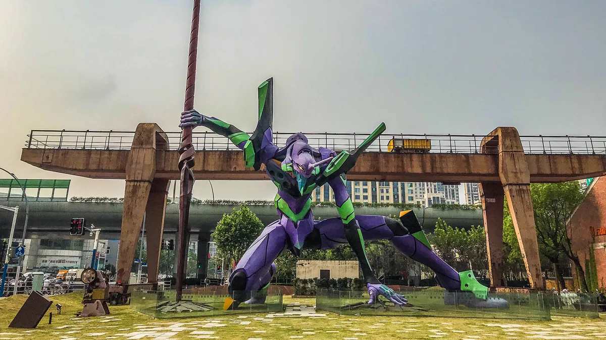 Giant Mecha Sculpture in Shanghai giant purple and green mecha sculpture in Shanghai from the sci-fi anime that popularized the cool kuudere type