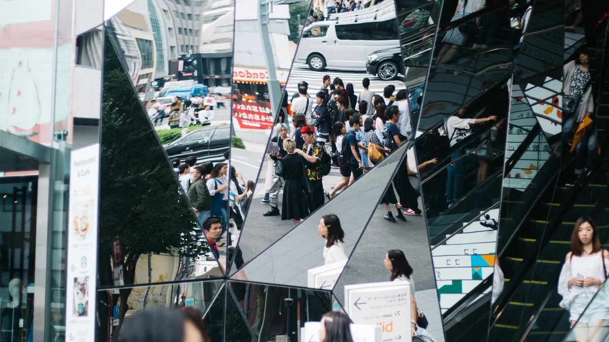 minimalist tokyo street fashion silhouette displaying clean lines and monochromatic styling