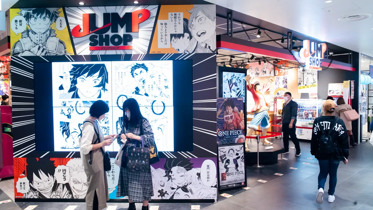 Official Shonen Jump merchandise and manga volume shelves in Tokyo